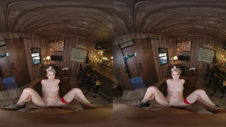 Blonde in a bar with nipple piercings spreads out topless on floor