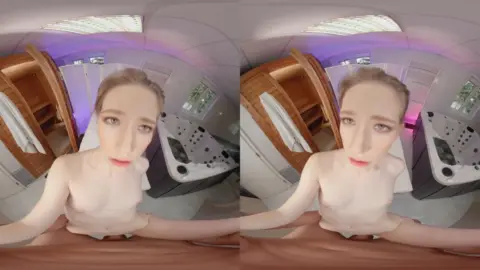 Blonde in purple room spreads, bends, and teases with fisheye 360