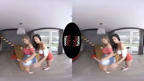 Blonde and brunette in VR girl-on-girl living room session