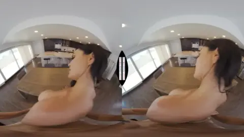 Brunette with big tits and nipple piercings rides giant hand on living