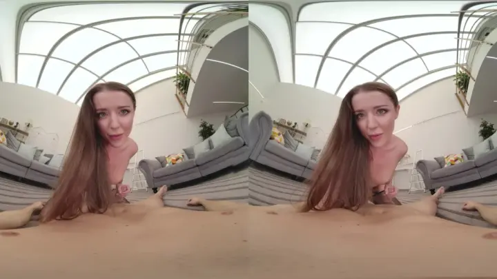 Brown-haired curvy white girl spreads on living room floor with fishne