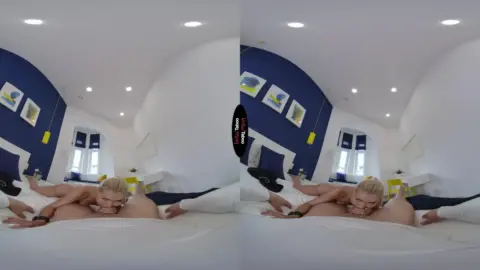 Blonde spreads legs on bed in bright 360-view bedroom scene