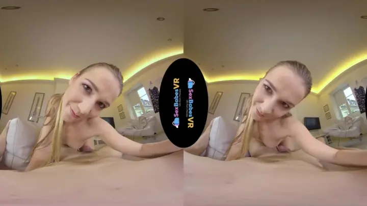 Blonde with tattoos jerks off in bed, legs spread wide on camera