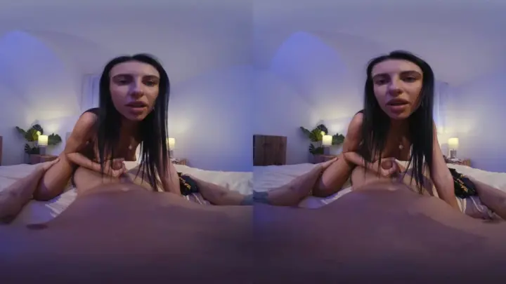 Black girl riding white guy in blue-lit bedroom