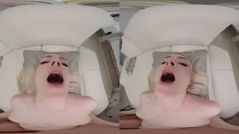 Blonde tattooed girl gives soft blowjob in bed with heart decor