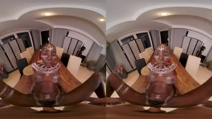 Black curvy girl with tattoos spreads out on living room floor