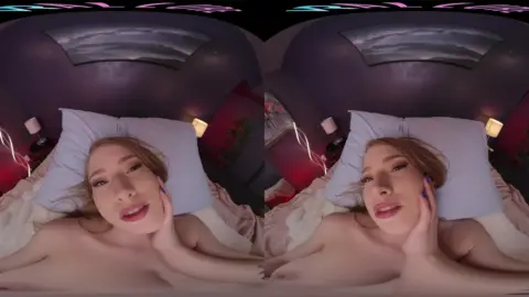 Blonde in blue eyes rides and sucks on bed in dim room