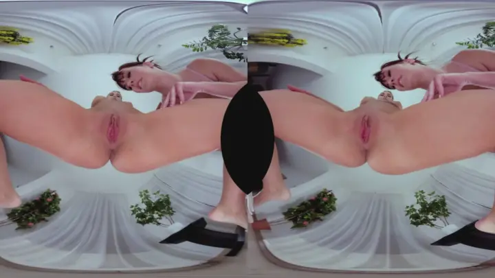 Brunette with arm tattoos spreads for camera in VR yoga pose
