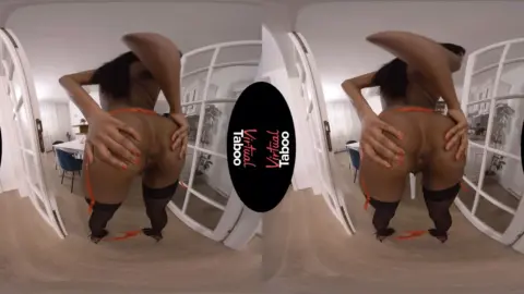 Black femme strips down in classroom, then moves to bed for posing