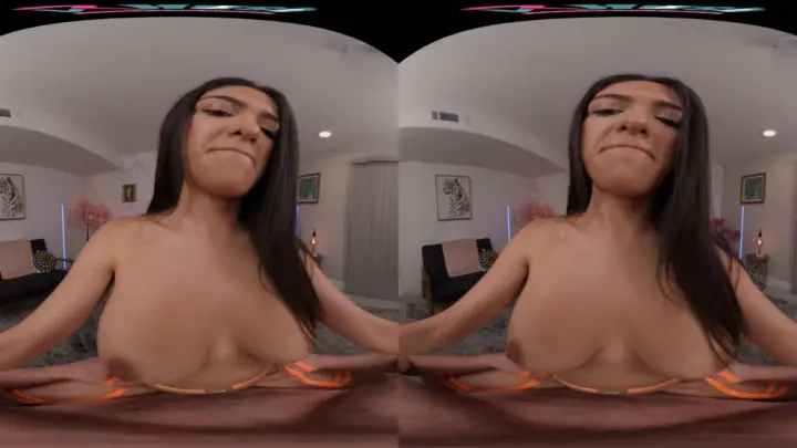 Asian brunette jerking off in orange bikini on bed