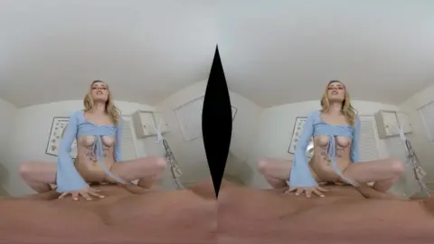 Blonde tattooed girl spreads wide on bed, nude posing turns to sex