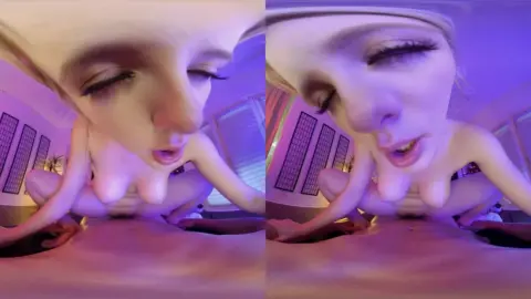 Blonde with leg tattoo jerking off in purple lit bedroom