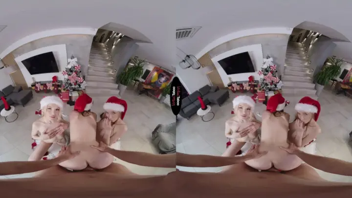 Two blonde lesbians make out and get naked on couch under Christmas li