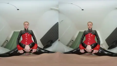 Blonde spreads wide on bed and floor in natural light bedroom session